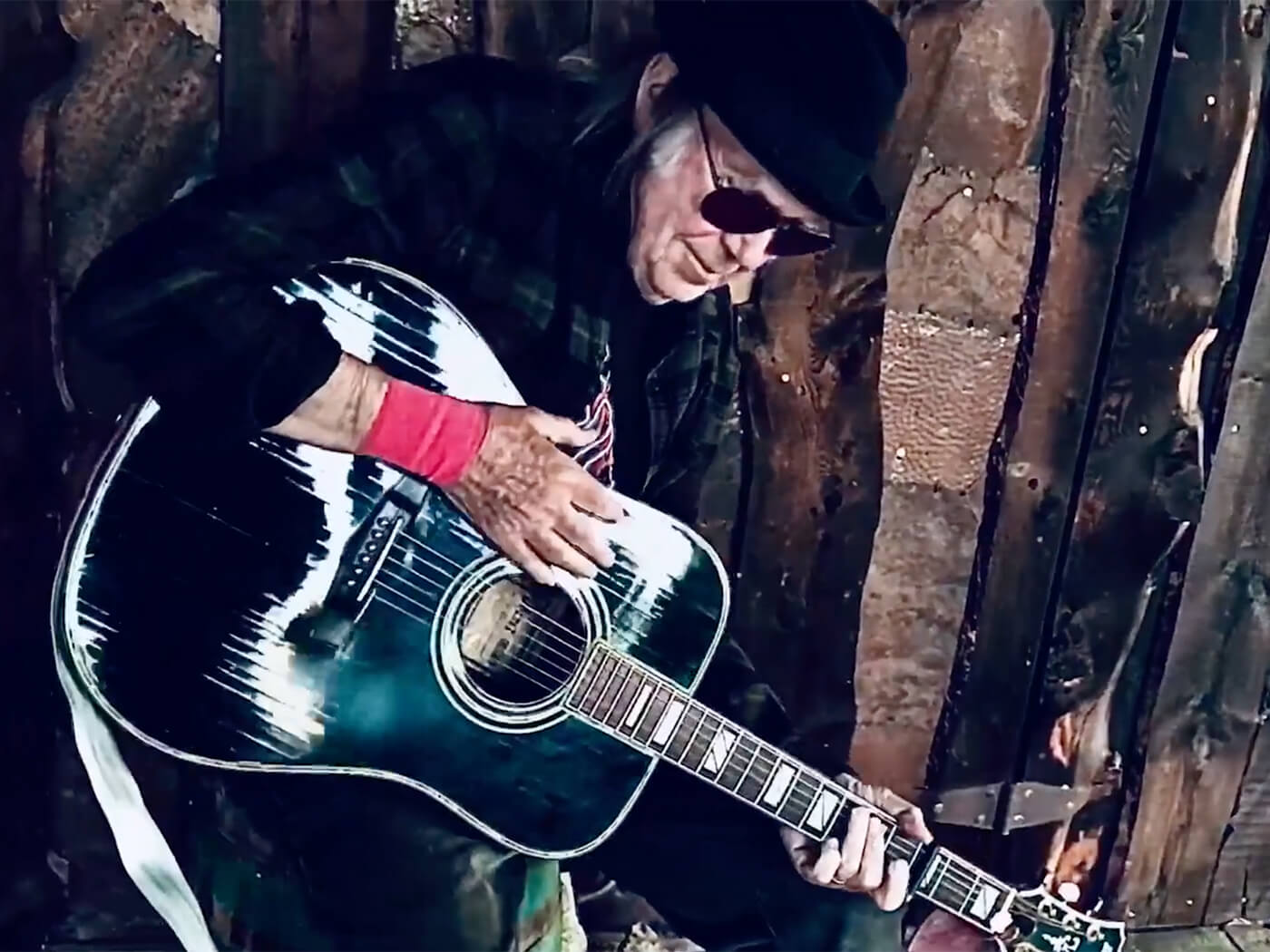 Watch Neil Young play “The Times They Are A-Changin'”